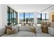 Spacious living area showcasing stunning city views from floor-to-ceiling windows at 1000 Water St # 1402, Tampa, FL 33602