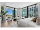 Spacious main bedroom with city views and sitting area at 1000 Water St # 1402, Tampa, FL 33602