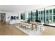 Bright dining area with large windows and hardwood floors at 1000 Water St # 1402, Tampa, FL 33602