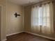 Bedroom featuring wood-look floors and neutral walls at 13933 Reindeer Cir, Hudson, FL 34669