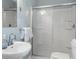 This bright bathroom features a shower and tub combination, a sink and a toilet at 532 Beach Ne Dr, St Petersburg, FL 33701