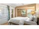 This bedroom features direct access to the bathroom, and good natural lighting at 532 Beach Ne Dr, St Petersburg, FL 33701