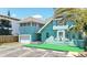 Rear exterior of building boasts ample parking, modern architecture, and convenient access at 532 Beach Ne Dr, St Petersburg, FL 33701