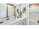 Clean bathroom with double vanity and separate tub and shower at 16285 Alpha Grove Pl, Odessa, FL 33556