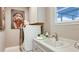 Bright laundry room with ample counter space and sink at 16285 Alpha Grove Pl, Odessa, FL 33556