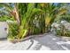 Attractive single Gathering home featuring meticulous landscaping with rock ground cover and tropical foilage at 1906 2Nd St, Indian Rocks Beach, FL 33785