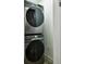 Samsung front loading washer and dryer in utility closet at 1906 2Nd St, Indian Rocks Beach, FL 33785