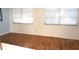 Bright bedroom with wood flooring and window at 4254 96Th N Ter # Two, Pinellas Park, FL 33782