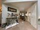 Welcoming foyer with neutral tones, tile floors, and decorative elements, creating a warm ambiance at 4608 Apple Ridge Ln, Tampa, FL 33624