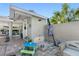 The backyard patio features outdoor kitchen with seating, as well as a play area at 4608 Apple Ridge Ln, Tampa, FL 33624