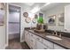 Elegant bathroom with double vanity and shower at 16240 Alpha Grove Pl, Odessa, FL 33556