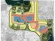 Aerial view of community with lake and numerous homesites at 16240 Alpha Grove Pl, Odessa, FL 33556