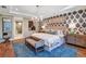 Spacious main bedroom with ensuite bathroom and walk-in closet at 16240 Alpha Grove Pl, Odessa, FL 33556