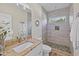 Bathroom with walk-in shower and granite countertop at 6435 Finance Ave, Weeki Wachee, FL 34607