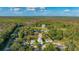 Aerial view showing house location near waterway and highway at 6435 Finance Ave, Weeki Wachee, FL 34607