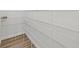 Bright walk-in pantry with ample shelving for storage at 6435 Finance Ave, Weeki Wachee, FL 34607