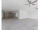 Spacious garage with high ceilings and ceiling fans at 6435 Finance Ave, Weeki Wachee, FL 34607