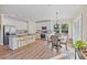 Modern kitchen with white cabinets and island at 6435 Finance Ave, Weeki Wachee, FL 34607