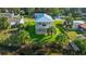 Elevated view of two-story home near the water at 6435 Finance Ave, Weeki Wachee, FL 34607