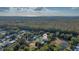 Aerial view of property near water, showcasing its location at 6435 Finance Ave, Weeki Wachee, FL 34607