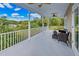 Relaxing balcony overlooking lush greenery at 6435 Finance Ave, Weeki Wachee, FL 34607