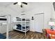 Guest bedroom with bunk beds and ample closet space at 1906 2Nd St, Indian Rocks Beach, FL 33785