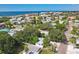 Wide aerial showcasing the property's location near the beach and neighboring houses at 1906 2Nd St, Indian Rocks Beach, FL 33785