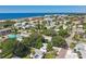 Wide aerial showcasing the property's location near the beach and neighboring houses at 1906 2Nd St, Indian Rocks Beach, FL 33785