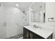 Bathroom boasts a large marble shower and modern vanity at 1906 2Nd St, Indian Rocks Beach, FL 33785