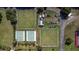 Aerial view of community shuffleboard and bocce ball courts at 1801 Bedford Ln # 27, Sun City Center, FL 33573