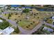 Aerial view of community park with gazebo and walkways at 1801 Bedford Ln # 27, Sun City Center, FL 33573
