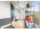 Enclosed patio functions as a laundry room with washer and dryer at 1801 Bedford Ln # 27, Sun City Center, FL 33573