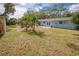 Large backyard with patio furniture and shed at 1949 Kings Hwy, Clearwater, FL 33755