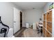 Bright and airy home office with a desk and storage at 3405 E 33Rd Ave, Tampa, FL 33610