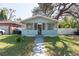 Quaint light blue house with screened porch at 3405 E 33Rd Ave, Tampa, FL 33610