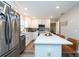 Modern kitchen with stainless steel appliances and a large kitchen island at 3405 E 33Rd Ave, Tampa, FL 33610