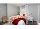 Charming bedroom featuring a queen-size bed and neutral color scheme at 3405 E 33Rd Ave, Tampa, FL 33610