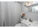 Clean bathroom with a shower/tub combo and white vanity at 3405 E 33Rd Ave, Tampa, FL 33610