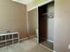 Bedroom with mirrored sliding doors and ample shelving at 724 Haven Pl, Tarpon Springs, FL 34689