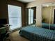 Second bedroom with window and built-in desk at 724 Haven Pl, Tarpon Springs, FL 34689