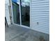 Small patio with sliding glass doors at 724 Haven Pl, Tarpon Springs, FL 34689