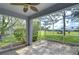 Enjoy golf course views from this screened porch at 20920 Eustis Rd, Land O Lakes, FL 34637