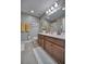 Double vanity bathroom with shower/tub combo at 2001 Palm Key Ave, Oldsmar, FL 34677