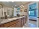 Elegant bathroom with double vanity and large shower at 2001 Palm Key Ave, Oldsmar, FL 34677