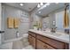 Double vanity bathroom with shower/tub combo at 2001 Palm Key Ave, Oldsmar, FL 34677