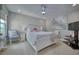 Spacious bedroom with comfy queen bed and sitting area at 2001 Palm Key Ave, Oldsmar, FL 34677