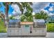 Community grills with ample space for outdoor cooking and entertaining at 2001 Palm Key Ave, Oldsmar, FL 34677