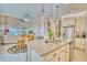 Modern kitchen with granite countertops and island seating at 2001 Palm Key Ave, Oldsmar, FL 34677