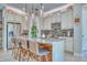 Modern kitchen with granite countertops and island seating at 2001 Palm Key Ave, Oldsmar, FL 34677