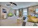 Bright living room with comfy seating and large TV at 2001 Palm Key Ave, Oldsmar, FL 34677